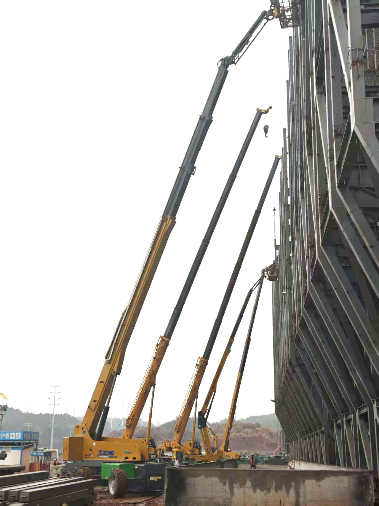 高空協(xié)同顯實(shí)力｜徐工裝備助陣銀聯(lián)黃山園區(qū)，外立面施工提質(zhì)增效